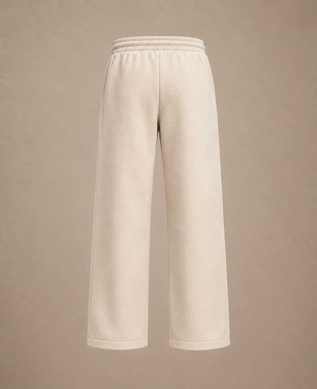 A pair of wide-leg cropped sweatpants in a light cream or off-white color, shown from the back against a solid neutral beige background.