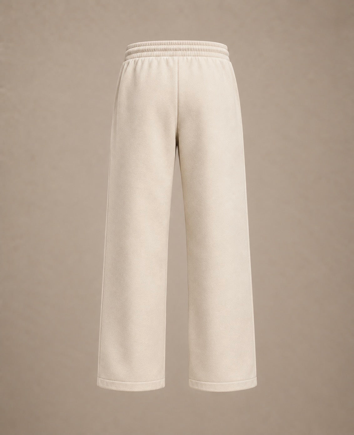 A pair of wide-leg cropped sweatpants in a light cream or off-white color, shown from the back against a solid neutral beige background.